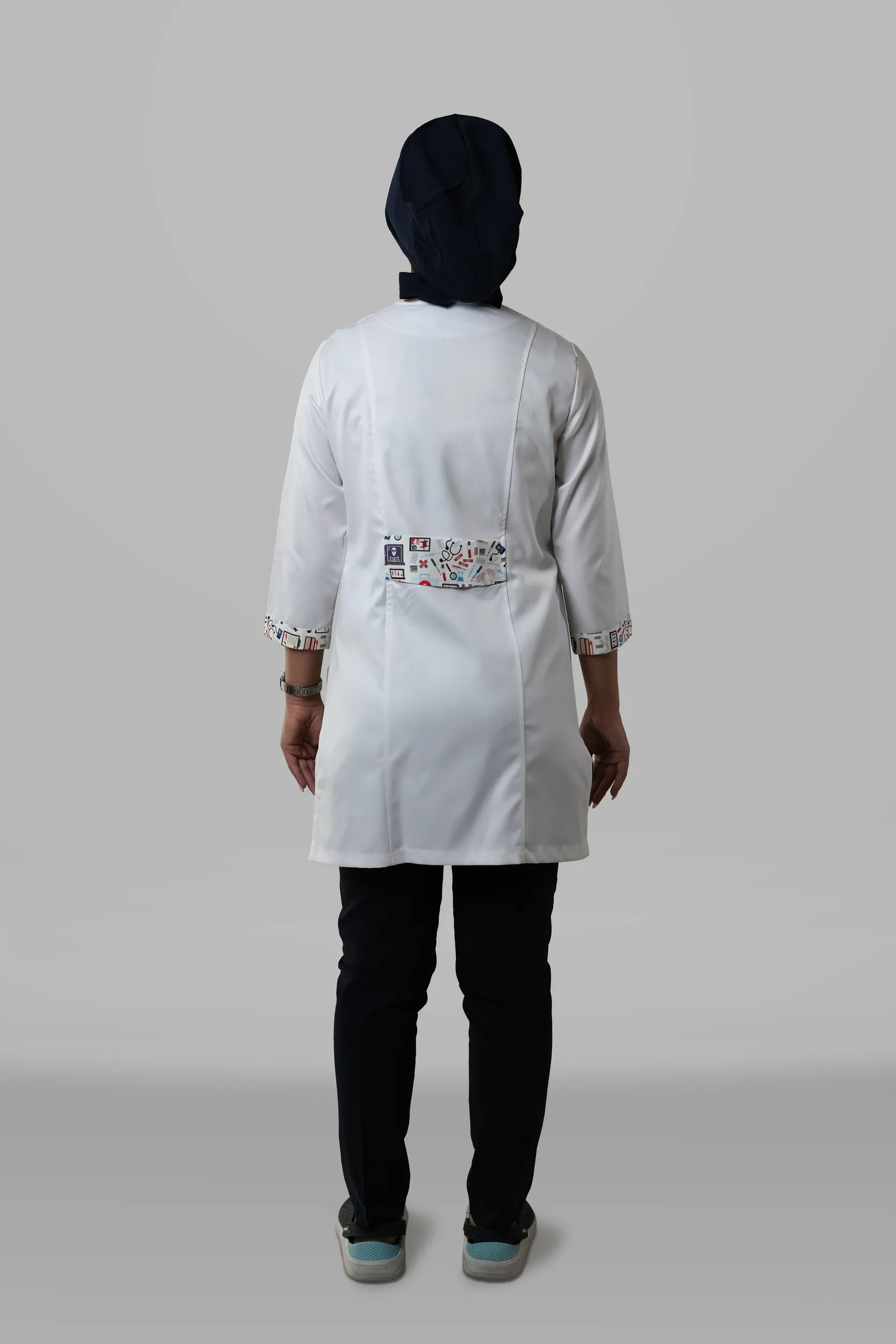 تصویر روپوش زنانه ترکیبی مدل مدیکال بنفش؛ نمای پشت محصول